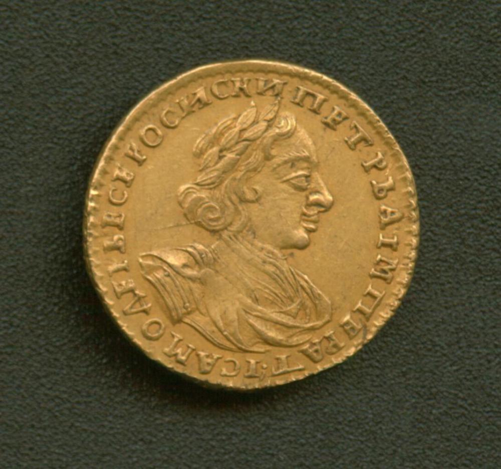 Монета петровского времени номиналом два рубля. 1723 г. Соловецкий музей-заповедник.